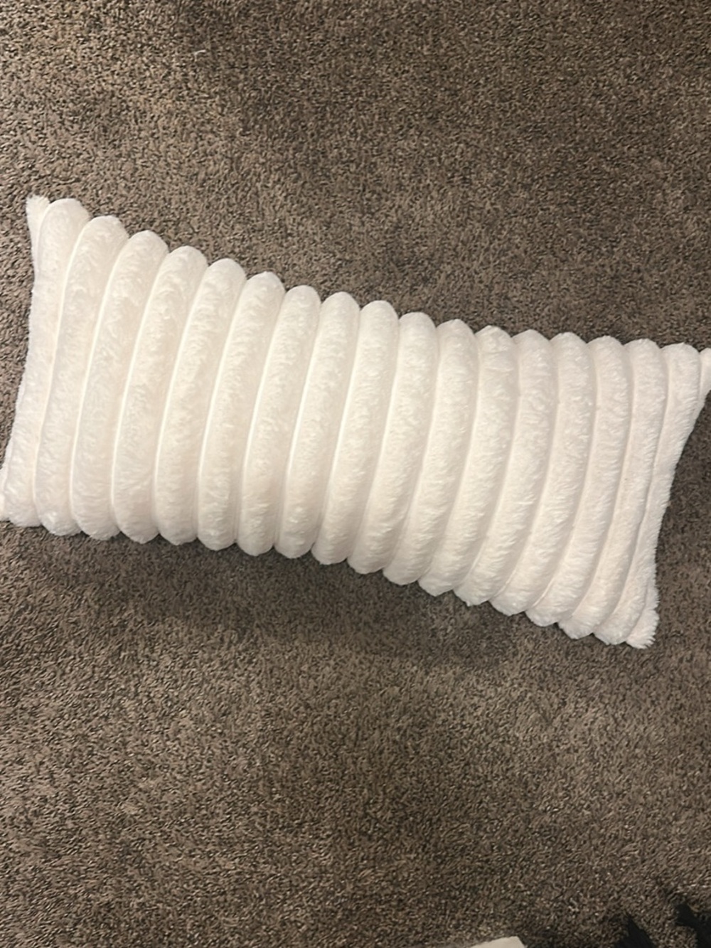 white ribbed pillow